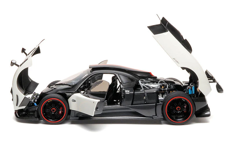 Almost-Real 2009 Pagani Zonda Cinque Coupe RHD Bianco Benny White & Carbon w/ Red Accents 1:18 - Image 4