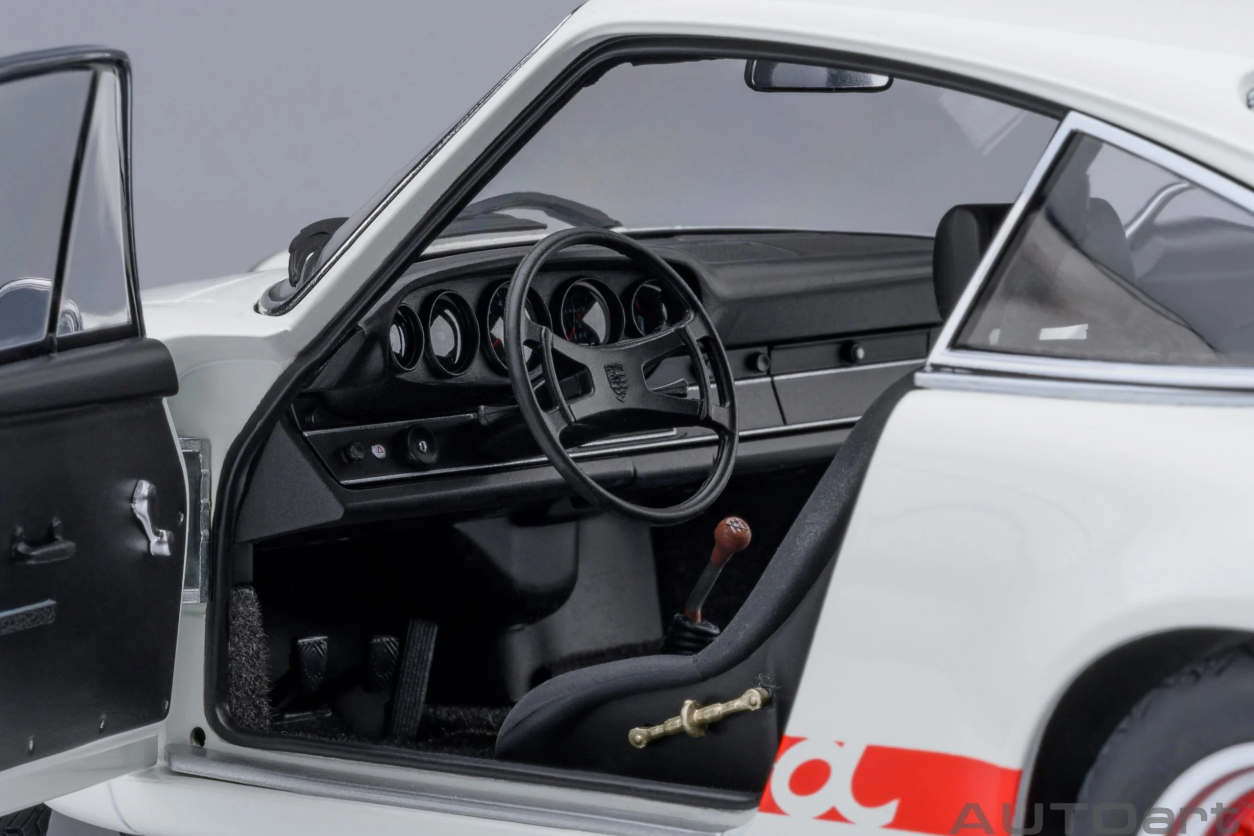 AUTOart Porsche 911 Carrera 2.7 RS Grand Prix White w/ Red "The Circuit Wolf" 1:18 - Image 9