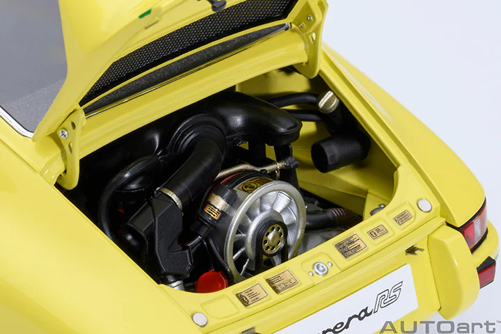 AUTOart Porsche 911 Carrera 2.7 RS Light Yellow w/ Green Deco and Wheels 1:18 - Image 14