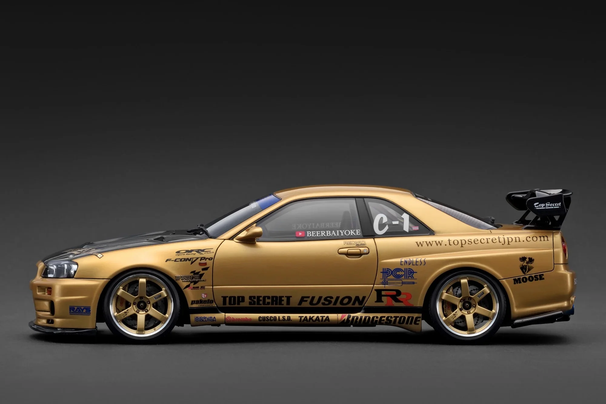 Ignition-Model Nissan Skyline GT-R R34 (BNR34) Top Secret Thailand 34GT-R Gold 1:18 - Image 3
