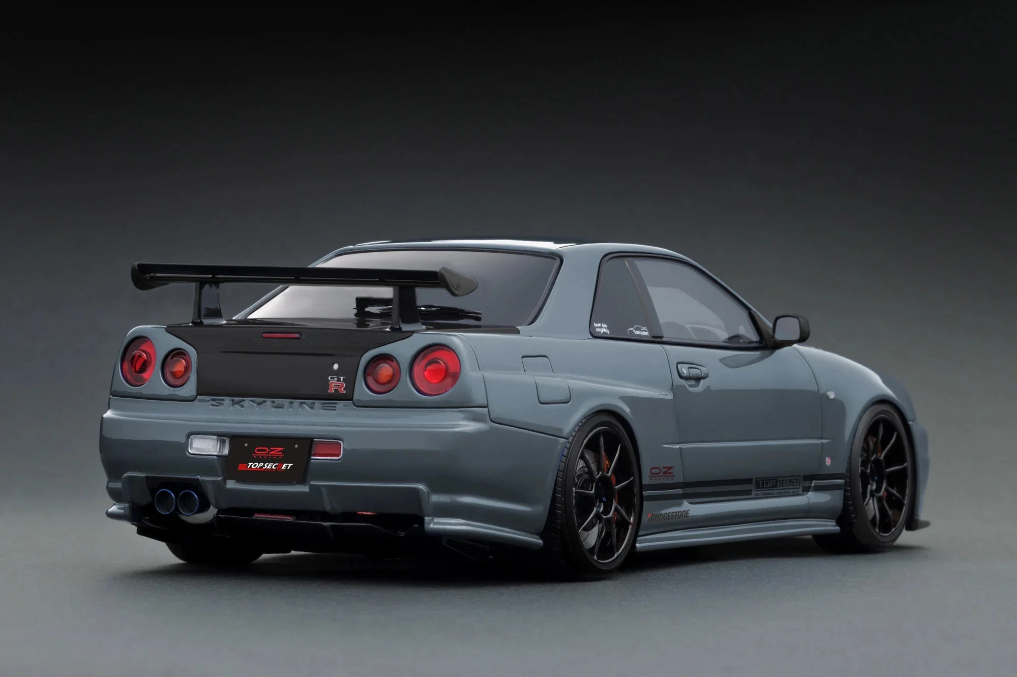 Ignition-Model Nissan Skyline GT-R R34 (BNR34) Top Secret 34GT-R RHD Stealth Grey w/ Carbon Fiber Hood 1:18 - Image 2