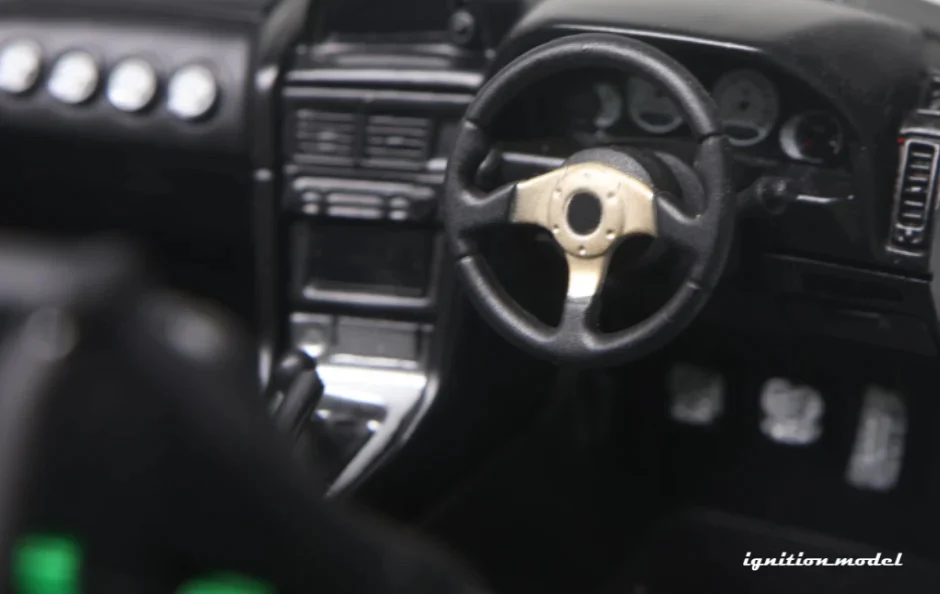 Ignition-Model Nissan Skyline GT-R R34 (BNR34) Top Secret 34GT-R RHD Stealth Grey w/ Carbon Fiber Hood 1:18 - Image 4