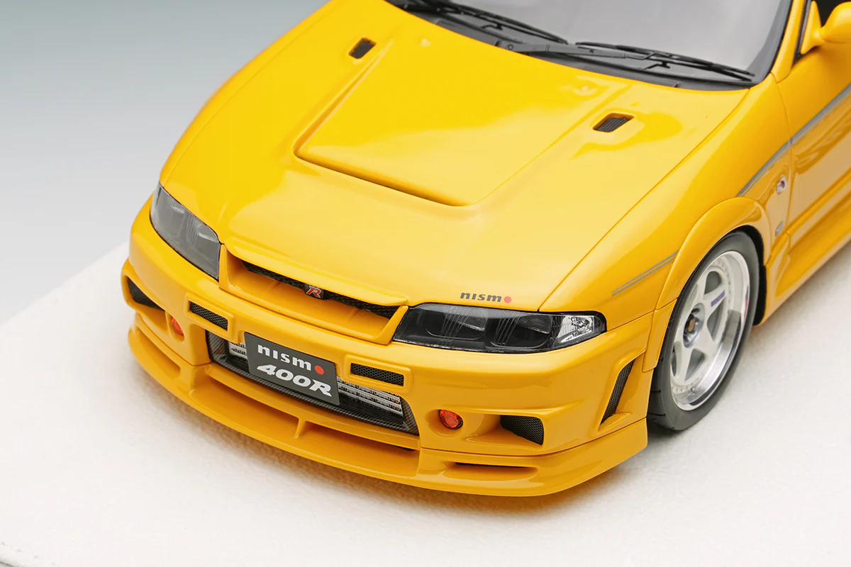 Make Up Co., Ltd / Eidolon 1996 Nissan Skyline 400R GT-R (BNR33) NISMO Yellow WITH DISPLAY 1:18 - Image 2