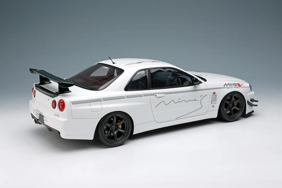 Make Up Co., Ltd / Eidolon Nissan Skyline GT-R (BNR34) V-spec N1 "Mine's" White WITH DISPLAY 1:18 - Image 2