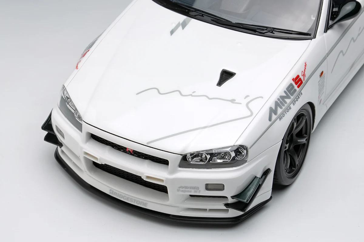 Make Up Co., Ltd / Eidolon Nissan Skyline GT-R (BNR34) V-spec N1 "Mine's" White WITH DISPLAY 1:18 - Image 4