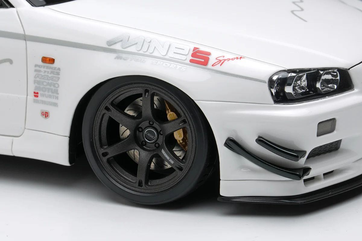 Make Up Co., Ltd / Eidolon Nissan Skyline GT-R (BNR34) V-spec N1 "Mine's" White WITH DISPLAY 1:18 - Image 7