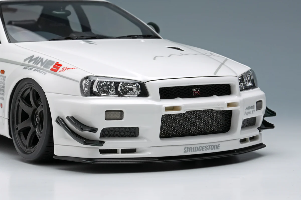 Make Up Co., Ltd / Eidolon Nissan Skyline GT-R (BNR34) V-spec N1 "Mine's" White WITH DISPLAY 1:18 - Image 8