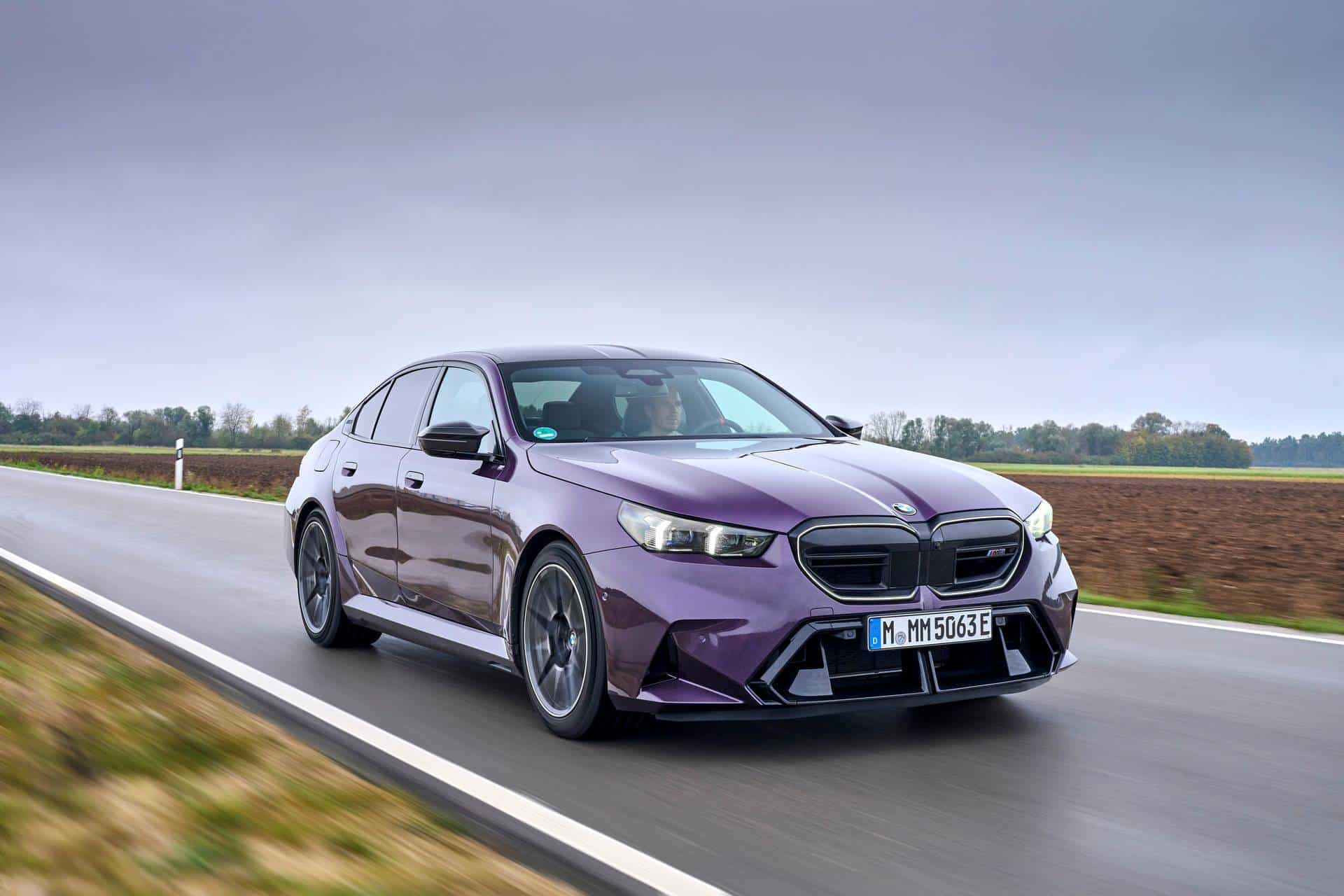 Minichamps 2024 BMW M5 (G90) Performance Parts Techno Violet Purple Metallic 1:18 DEALER EDITION