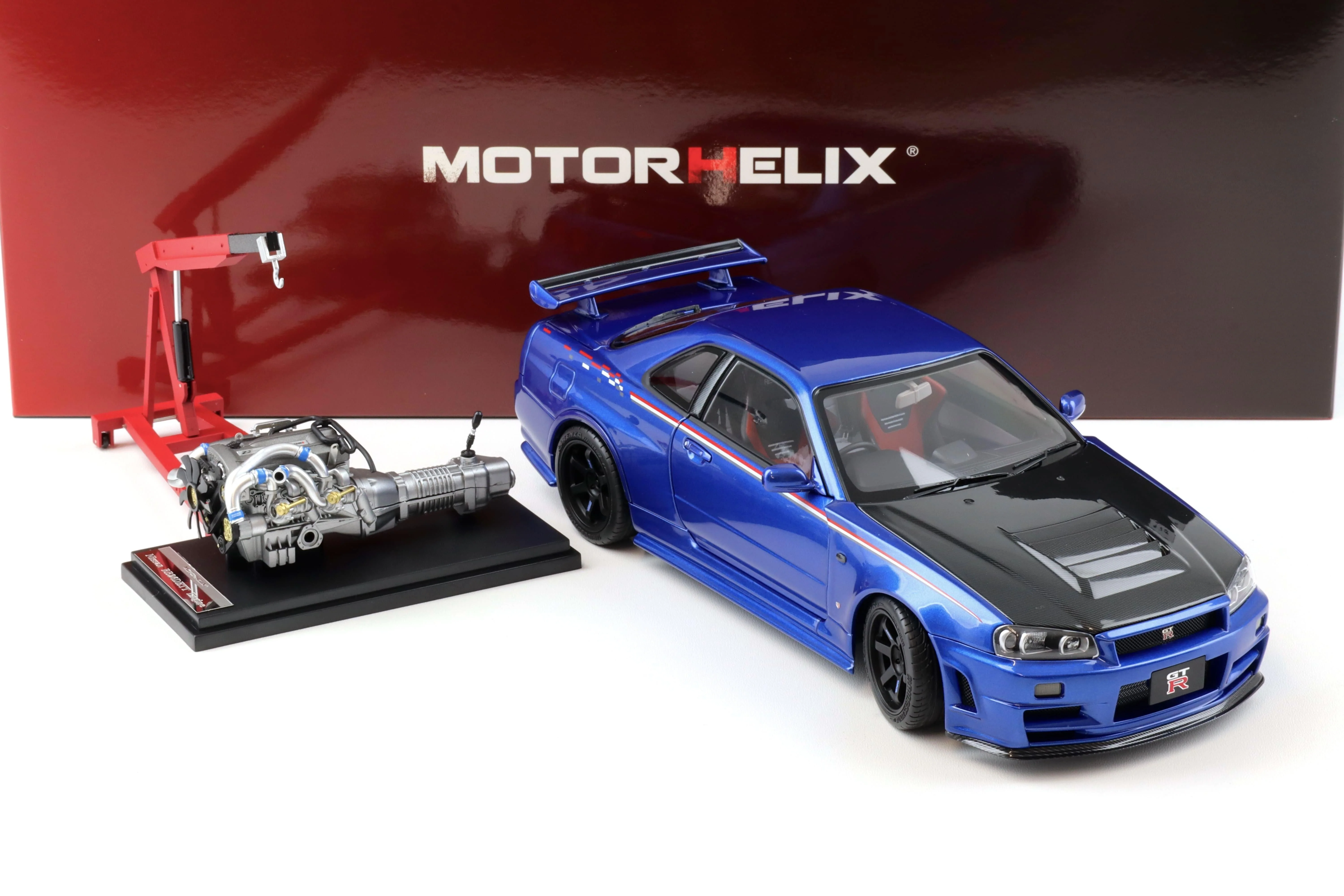 Motorhelix 2002 Nissan Skyline GT-R R34 (BNR34) Nismo CRS RHD Bayside Blue w/ Carbon Hood 1:18 - Image 3