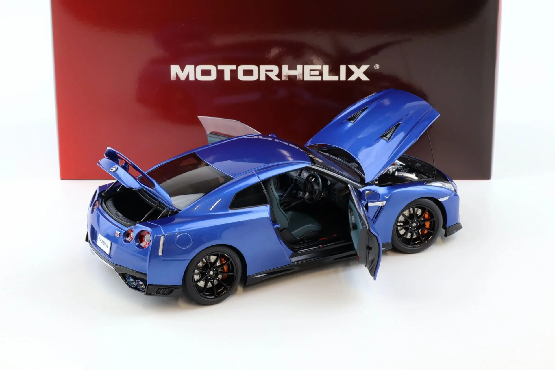 Motorhelix 2022 Nissan Skyline GT-R R35 Nismo Track Edition Wangan Blue 1:18 - Image 4