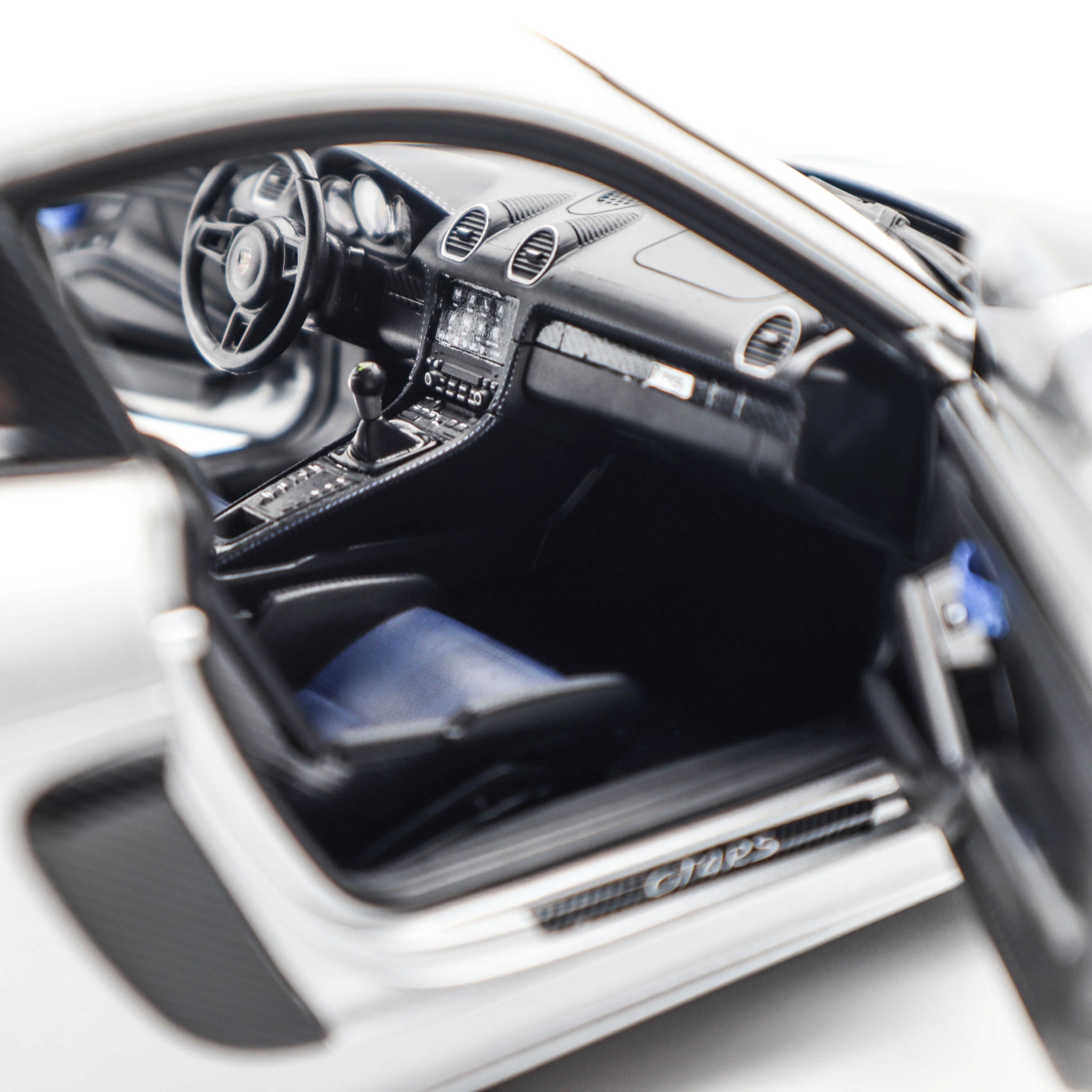 Norev 2023 Porsche 718 Cayman GT4 RS w/ Weissach Package GT Silver Metallic 1:18 - Image 17