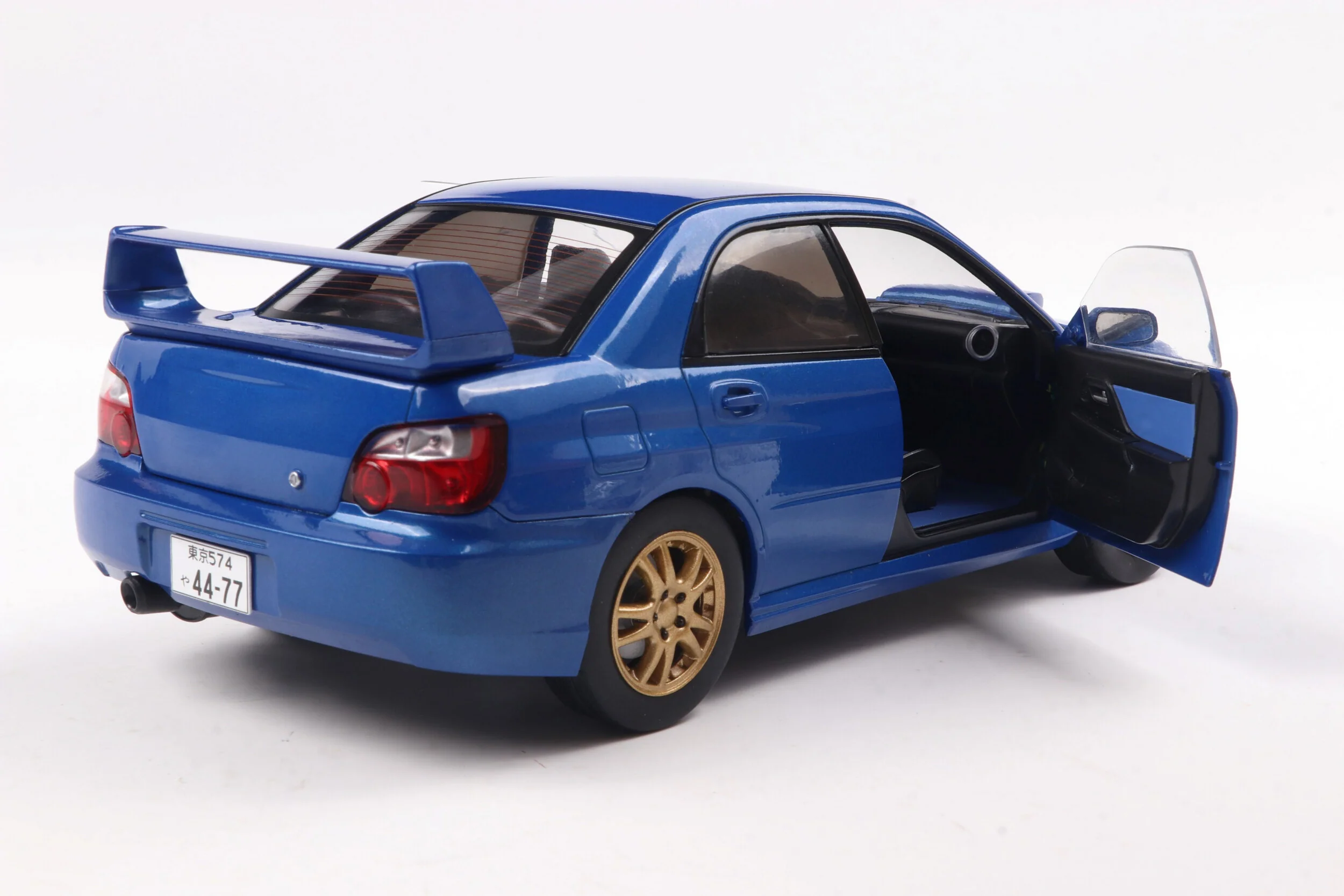 Solido 2003 Subaru WRX STi (GDB) Sonic Blue w/ Gold Wheels 1:18 - Image 8